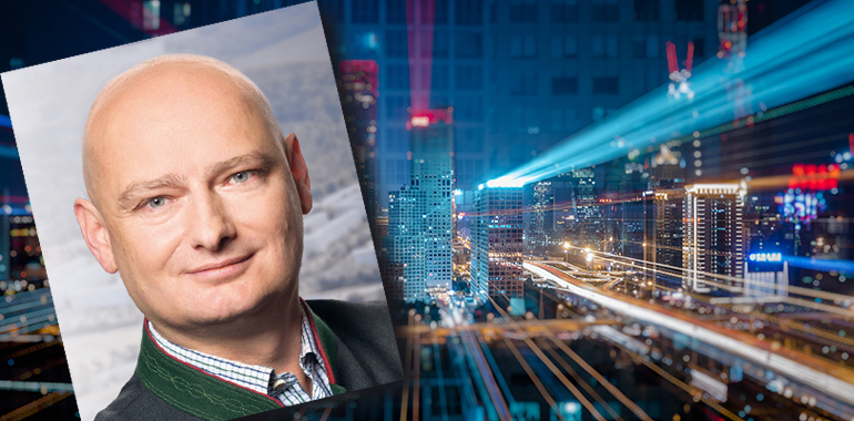 Light trails above buildings at night in China.