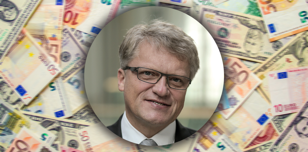 Texture of banknotes and a cup of coffee. Money. Selective focus.